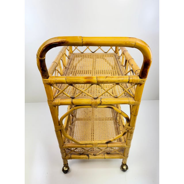 Vintage Bamboo and Cane Two-Tier Bar Cart With Brass Casters For Sale - Image 11 of 13