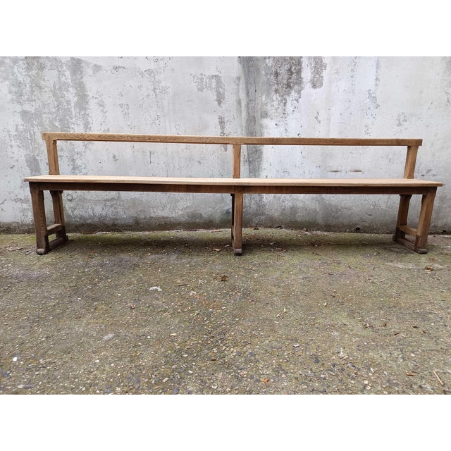 Old stripped solid oak church pews, possibility of purchasing them with their original dark patina.