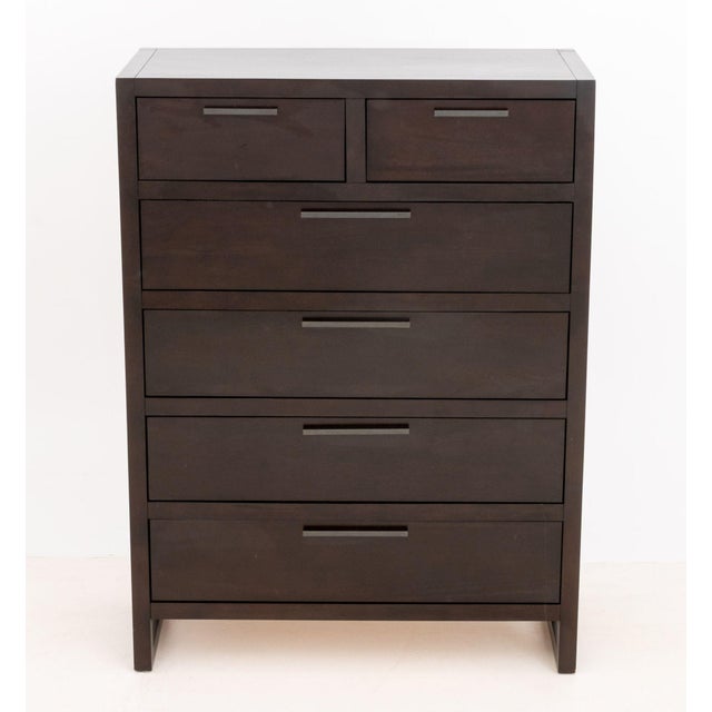 Casana "Tahoe" Ebonized Wood Dresser, two short drawers above four graduated drawers, "Casana" label to reverse. 53" H x...