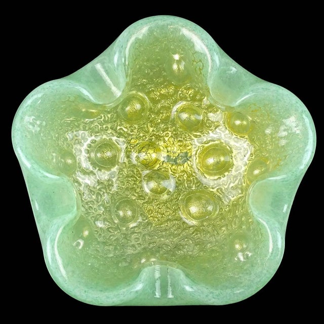Beautiful and rare, vintage Murano hand blown light green and gold flecks Italian art glass bowl with internal decoration....