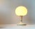 - Small German table light - Composed of acrylic and opaline glass - Manufactured by HOSO in Germany during the 1970s - In...