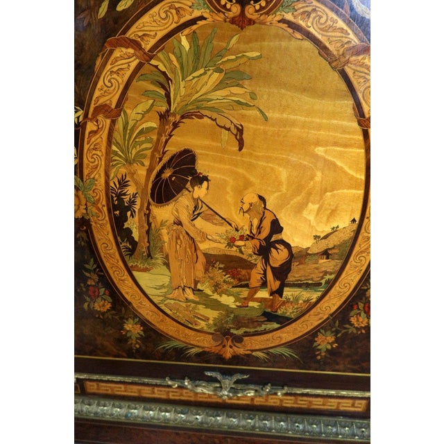 "Napoleon III support buffet" Support buffet in native wood marquetry from napoleon III. Rare Chinese ornamentation on the...
