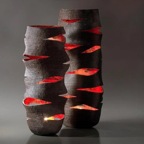 EMBER Wave by Donatas Zukauskas A dual-purpose sculptural object: by day, a stone-look decorative vessel whose undulating...
