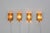 A set of four gold glass and brass Atlantic wall lamps that are produced by Danish lighting manufacturer Vitrika in the...