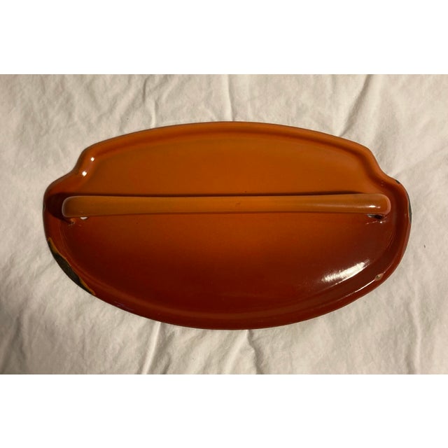 Vintage enamelware wall hanging device to hold kitchen textiles Possibly Eastern European ( kitchen towel prop not included )
