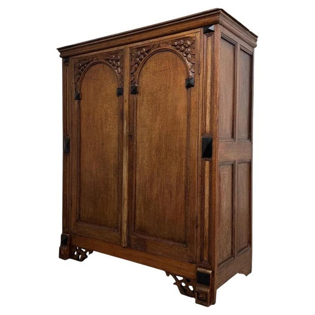 A handsome and substantial English Georgian cupboard dating from the 18th century, finely constructed in oak and...