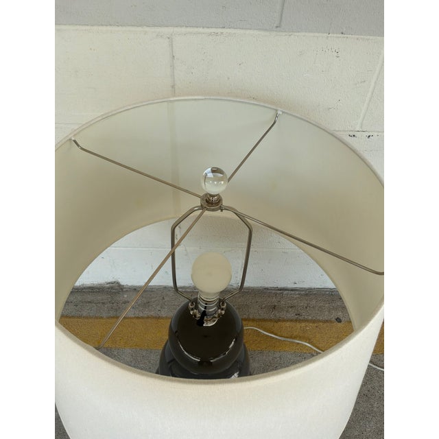 Triple Gourd Lamp on Acrylic Base. Gourd ceramic muted blue body on square acrylic base. White empire shade. Showroom...