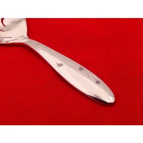 For sale is a sweet Gorham solid sterling pierced bon bon nut spoon in the starburst CELESTE pattern, introduced in 1956....