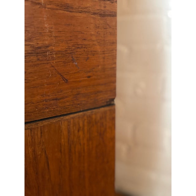 Pair of low profile walnut cube accent tables with black formica tops each in good vintage condition with noticeable wear...