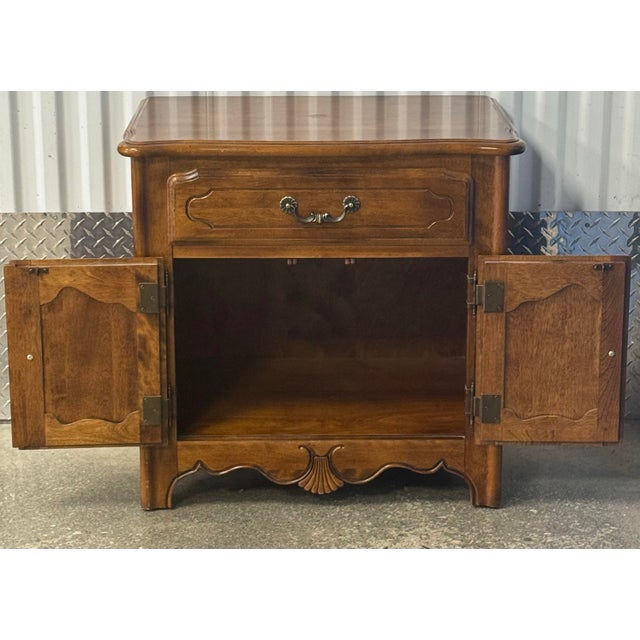 Beautiful country French nightstand by Ethan Allen from their highly sought after legacy collection. Single dovetailed...