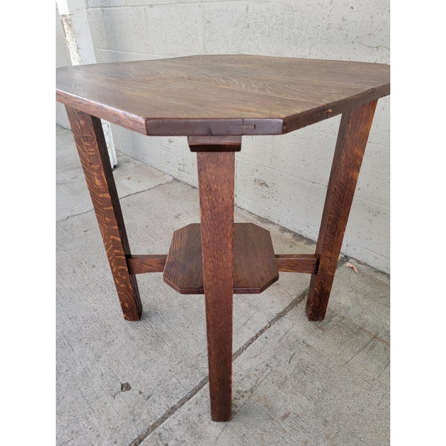 L&JG Stickley Oak Clip-Corner Lamp Table Circa. 1910. Period Mission Oak / Arts & Crafts side table made of solid oak and...