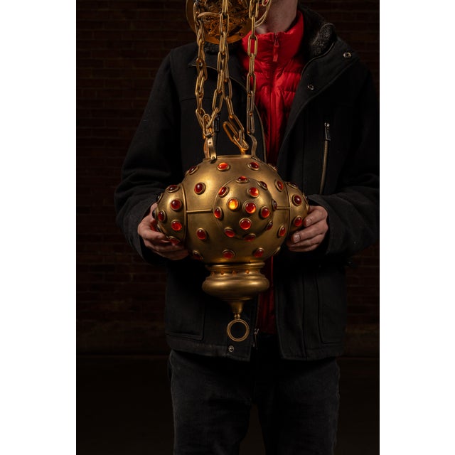 Sculptural mid-century flush-mount lamp executed in a gilded Renaissance Revival style, formed as a multi-lobed orb...