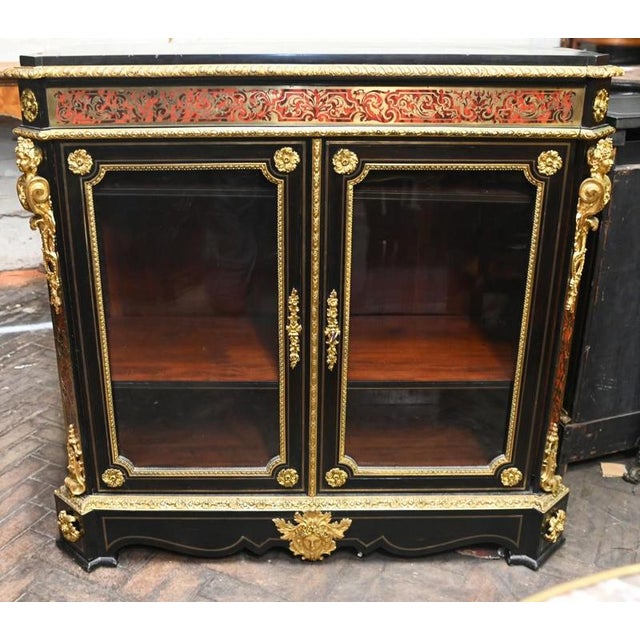 You are viewing a gorgeous French cabinet or vitrine with Boulle style inlay work Circa 1860 the cabinet is well crafted...