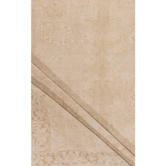 A beautiful hand-knotted rug, traditionally crafted by skilled artisans using fine-quality wool. The hand-knotted...
