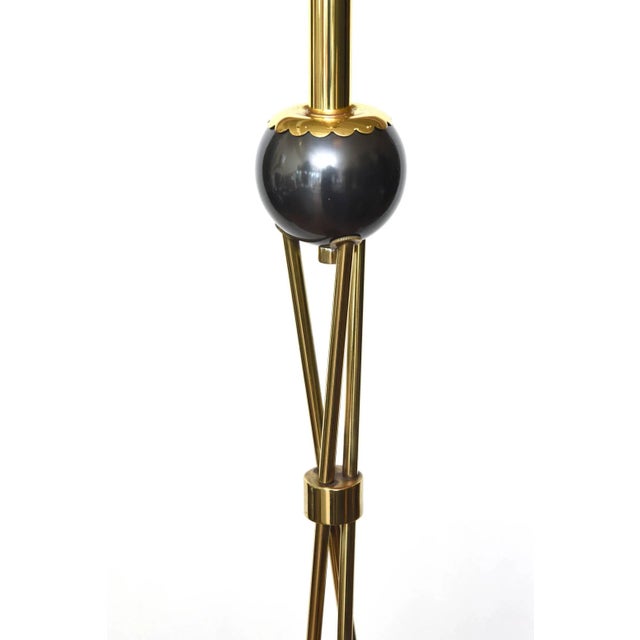 This chic and fully restored midcentury floor lamp is a combination of polished brass and gunmetal.It has been rewired and...