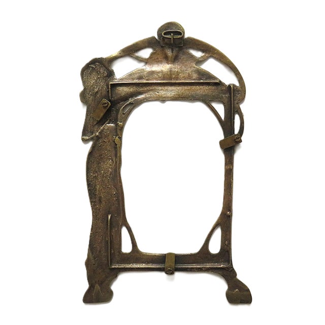 FREE SHIPPING ANYWHERE IN THE CONTINENTAL US! This is a vintage photo frame with a beautiful woman gazing up at the...