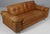 Danish furnituremaker two seat sofa in brutalist style. Made in patinated leather. Based on wheels. Made in Denmark in the...