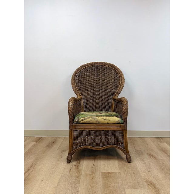 This charming vintage wicker rattan accent chair with a beach-themed cushion is a warm and characterful coastal and boho...