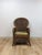 This charming vintage wicker rattan accent chair with a beach-themed cushion is a warm and characterful coastal and boho...