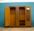 A vintage 1930s walnut wardrobe in the Art Deco style, with beautifully matched walnut veneer and a striking book-matched...