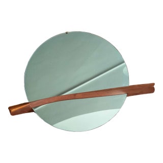 Mid-Century Modern Round Mirror With Sculptural Carved Walnut Accent For Sale