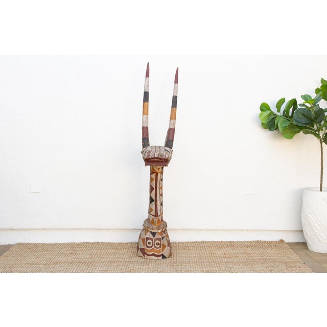 A rare and exceptional piece, this large African antelope mask from the Kurumba people is a must-have for collectors and...