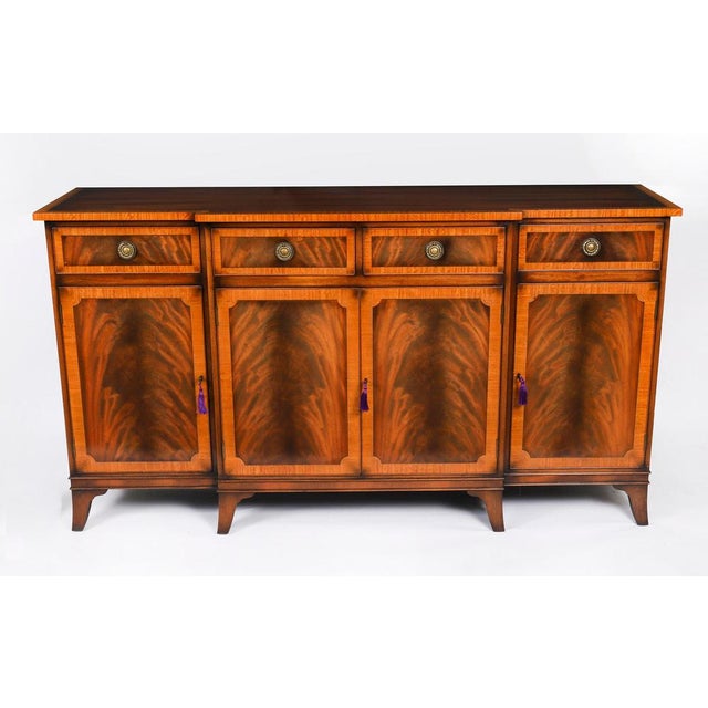 This is a fabulous Vintage Regency Revival flame mahogany breakfront sideboard, bought at great expense from Harrods and...