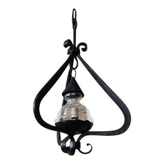 French Early 20th Century Hand-Forged Black Iron Chandelier For Sale
