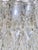 Vintage Hollywood Regency Floral Embossed Brass Tiered Waterfall Crystal Flush Mount Chandelier For Sale In New York - Image 6 of 7
