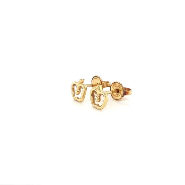 This authentic Tiffany & Co. pair comes from the beloved Apple Collection by renowned designer Elsa Peretti. Crafted in...