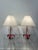 These vintage Jacques Adnet red stitched leather lamps with tri-pod style legs, leather strap to body. Fully updated...