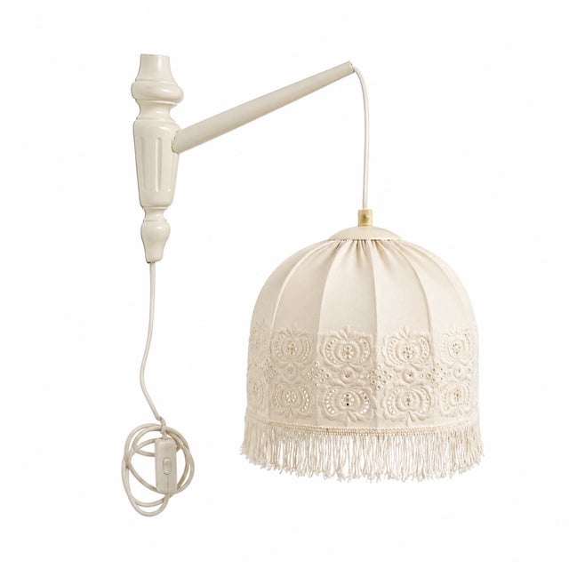 A pair of original wall sconces by Markslöjd, manufactured in Kinna, Sweden — one of Northern Europe's foremost lighting...