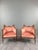 An elegant pair of Louis XVI style bergère armchairs in carved and molded wood, resting on fluted, tapered legs. The...
