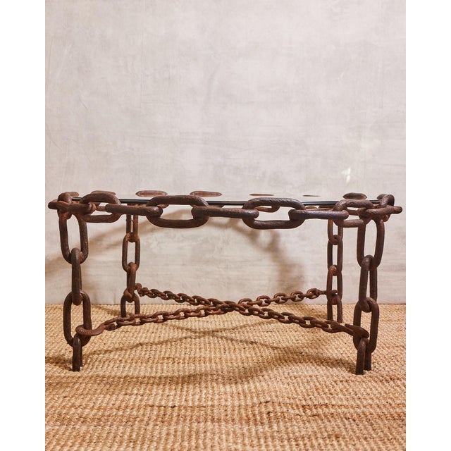 Artisan made linked chain 40 inch round coffee table. The heavy duty chain links have just the right amount of patina....