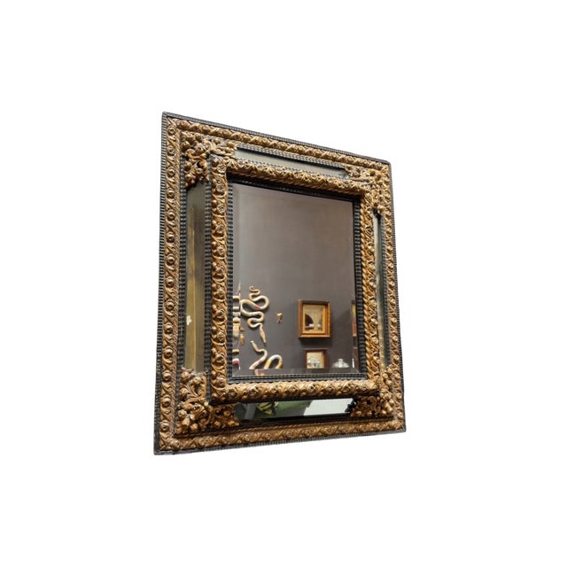 Beautiful elegant 19th century Dutch repoussé brass and wood mirror. Hand made in the Netherlands. In good condition with...