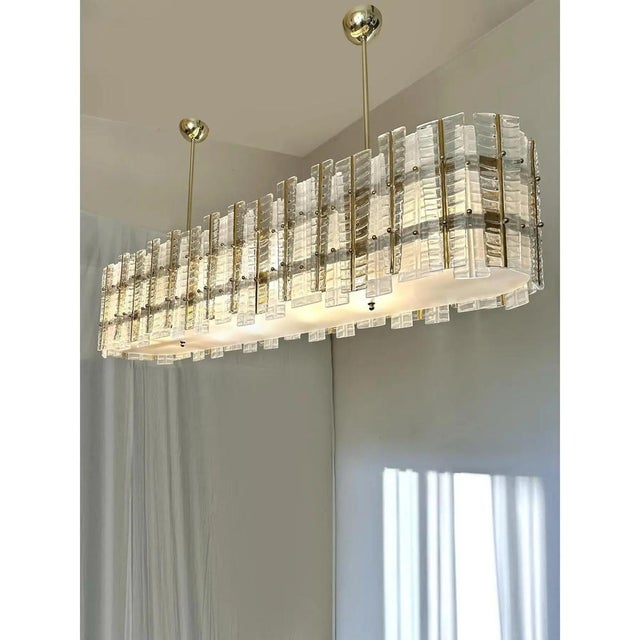 Modern italian tropical gold murano glass chandelier by simoeng, in exhibition piece conditions. Designed from 2000 up to...