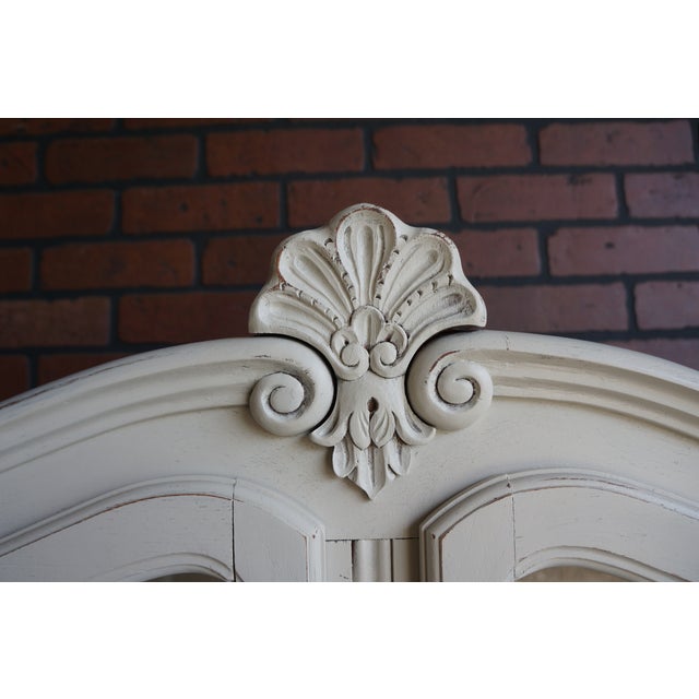 Petite and sweet and O So French. Perfect for a smaller dining room or picture it as linen storage in a bathroom. The top...