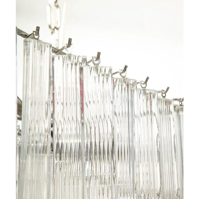 Midcentury Italian hand-blown glass chandelier with rectangular ridged glass panes, circa 1960. Chain is 9" from canopy.