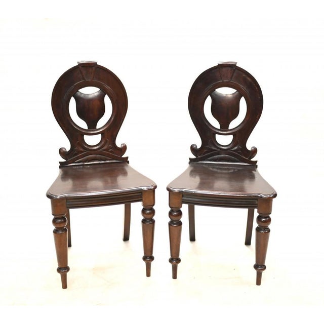 Elegant pair of Victorian hall chairs in mahogany Circa 1840 on this refined pair of chairs Great design and would work...