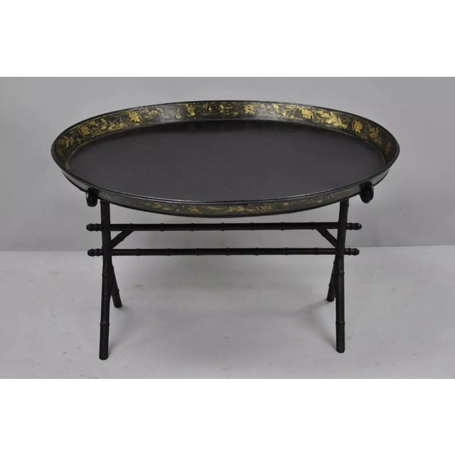19th Century English Victorian Leather Tole Tray Coffee Table on Faux Bamboo Base. Item features gold gilt decoration to...