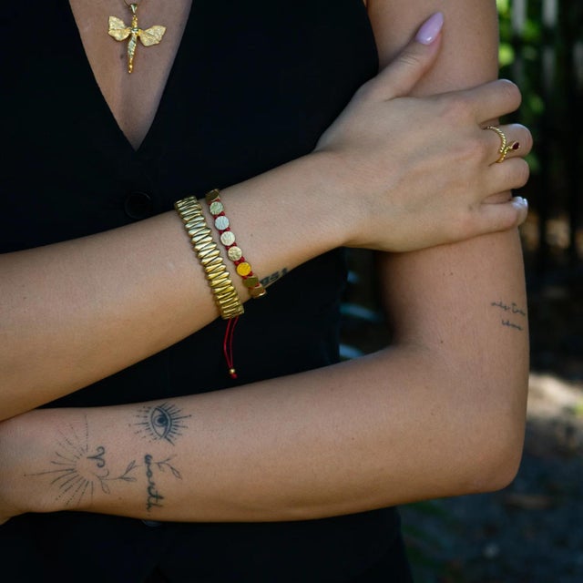 Embrace balance, power, and protection with the Strength & Luck Red Gold Adjustable Unisex Bracelet. Handcrafted with...
