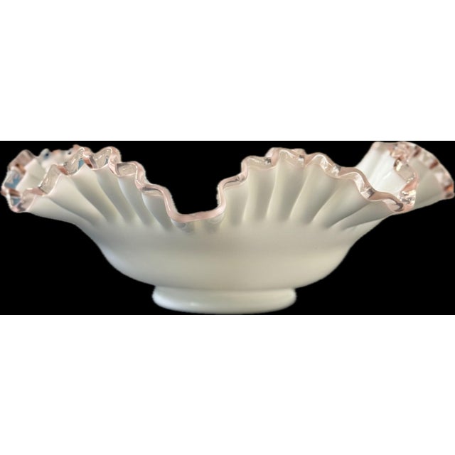 This exquisite unmarked 10-inch Fenton Rose Crest crimped milk glass bowl is a stunning example of mid-century American...