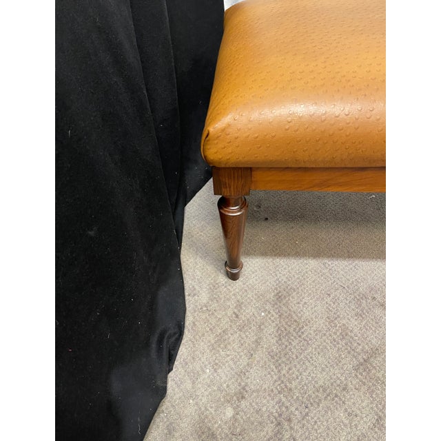 Beautiful mid century modern long rosewood bench with tapered legs. Made in the 1960s in the USA. Recently upholstered in...