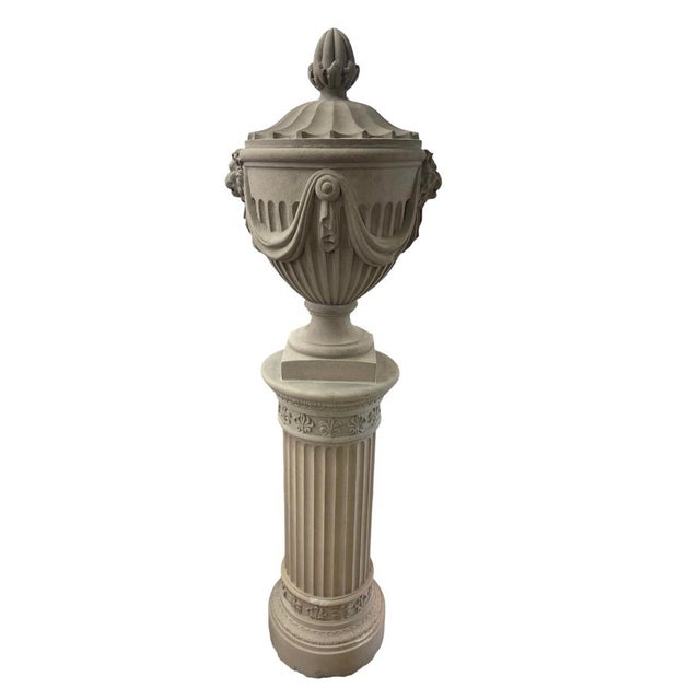 This magnificent pair of vintage cast stone garden urns and pedestals, handcrafted in Italy, brings timeless architectural...