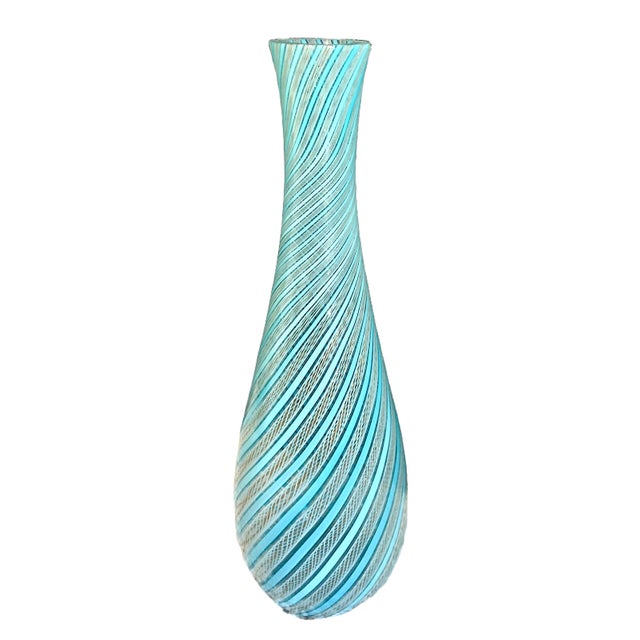 This exquisite item is a vintage Venetian art glass vase from Murano, Italy. It was crafted of delicate, interwoven glass...
