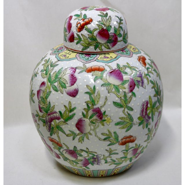 Add a vibrant touch of classic Chinoiserie elegance to your space with this large, vintage Chinese porcelain ginger jar....