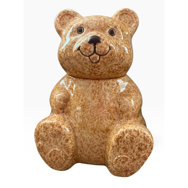 Charming vintage Avon teddy bear cookie jar in a warm speckled brown ceramic finish. The seated bear features a whimsical...
