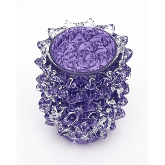 Murano glass vase, Italian, from the island of Murano. This hand-blown piece has a striking purple color and is made with...