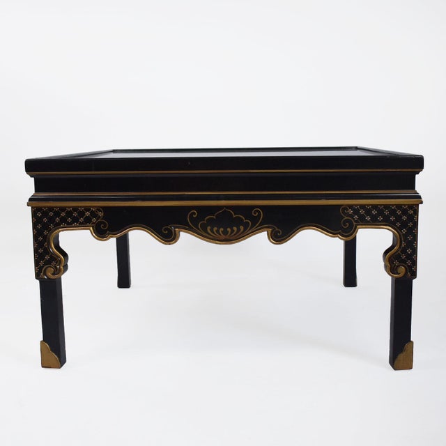 Black Chinoiserie Coffee Table in nice as found vintage condition. There are minor scuffs, scrapes and wear to the as...