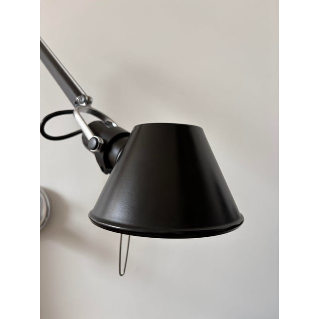 One pair of Classic Wall Mounted J-Bracket Artemide Tolomeo Swing Lamps in Black. These lamps are designed for in wall...